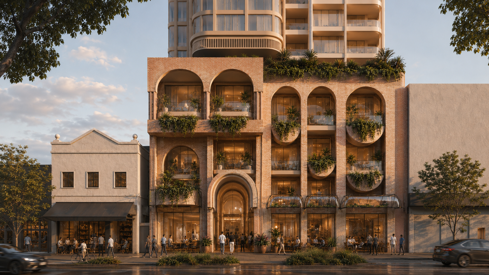 The five-storey brick podium with arched openings and hanging gardens.